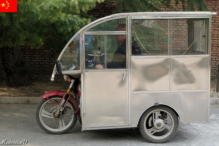 Beijing-384.jpg - Un moyen de transport contre les intempéries